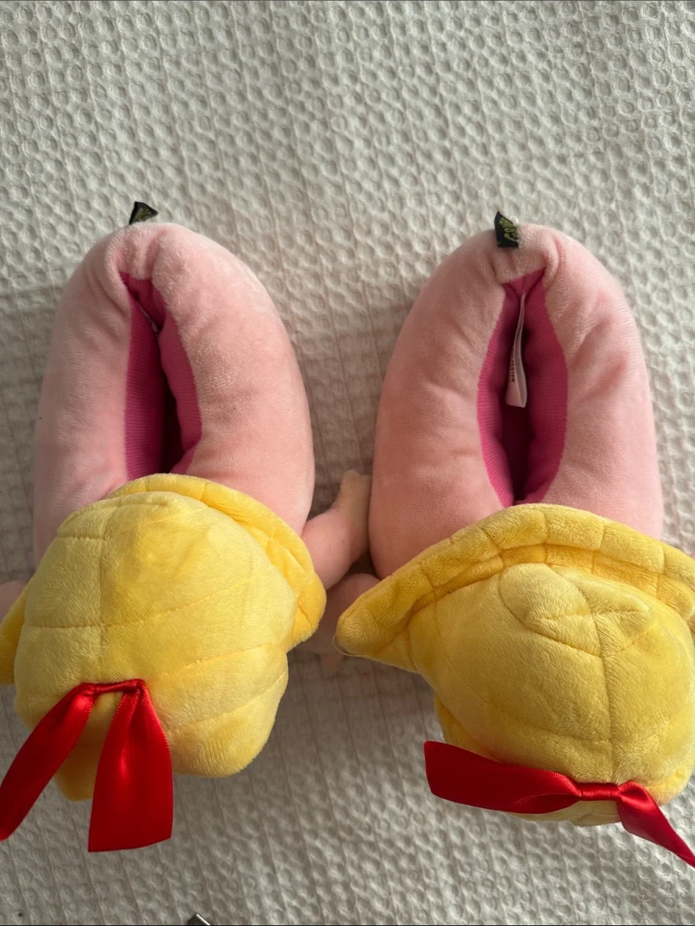 Plush Pink Cindy Lou who slippers with Yellow Hair and Red Bows